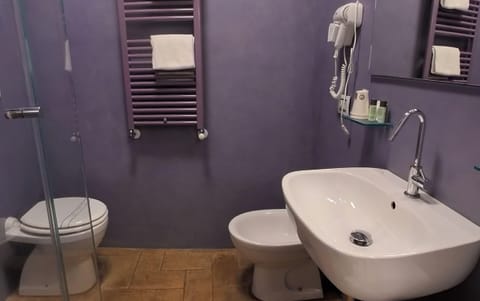 Shower, free toiletries, hair dryer, slippers