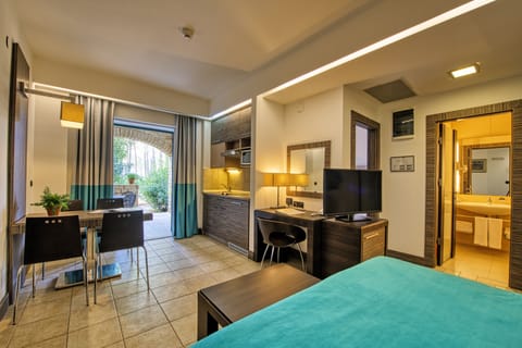 Comfort Apartment for 4 Persons | Living area | 80-cm flat-screen TV with satellite channels, TV, iPod dock