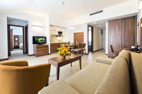 Superior Apartment for 5-6 Persons | Living area | 80-cm flat-screen TV with satellite channels, TV, iPod dock