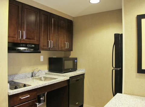 Suite, 1 King Bed, Accessible, Bathtub | Private kitchen | Full-size fridge, microwave, stovetop, dishwasher