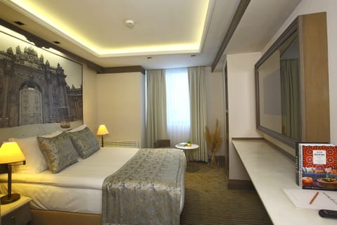Economy Room | Premium bedding, in-room safe, individually furnished, desk