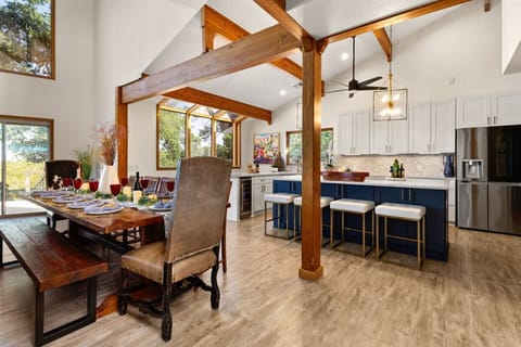 Large indoor natural wood dining table makes for great family gatherings whether casual or formal.