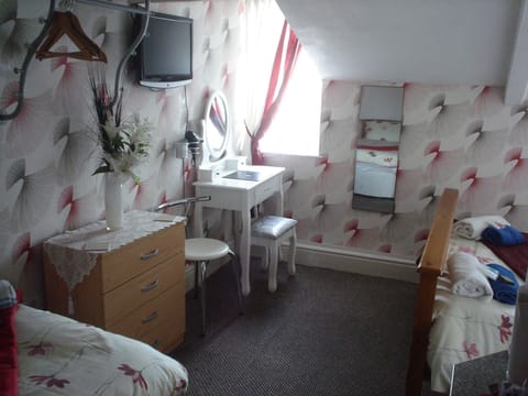 Family Room, Shared Bathroom (Room 8 Small family room) | Iron/ironing board, free WiFi, bed sheets