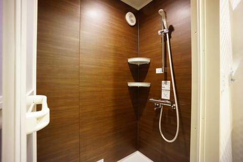 Superior Quadruple Room | Bathroom | Shower, hair dryer, slippers, electronic bidet