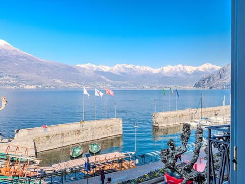 Body Of Water, Mountainous Landforms, Mountain, Coastal And Oceanic Landforms, Mountain Range, Sea, Lake, Coast, Hill Station, Boat