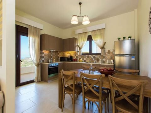 Villa | Private kitchen | Highchair, cookware/dishes/utensils