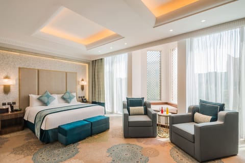 Mashreq Suite | Egyptian cotton sheets, down comforters, memory foam beds, minibar