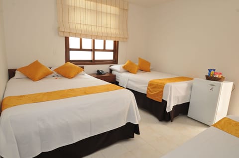 Standard Quadruple Room, 1 Bedroom, Non Smoking, Ensuite | Pillowtop beds, minibar, iron/ironing board, free WiFi