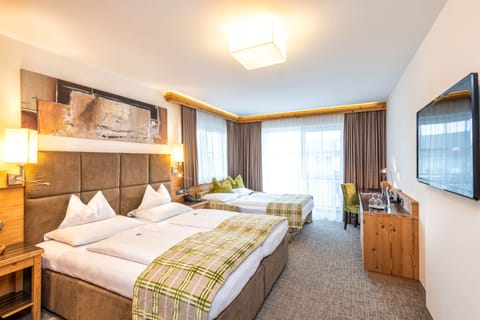 Comfort Quadruple Room, Private Bathroom | Premium bedding, down comforters, minibar, in-room safe