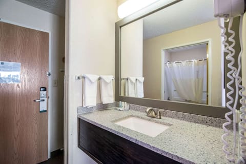 Standard Room, 2 Queen Beds, Non Smoking | Bathroom | Combined shower/tub, hair dryer, towels