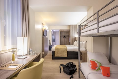 Family Room | In-room safe, desk, blackout drapes, iron/ironing board