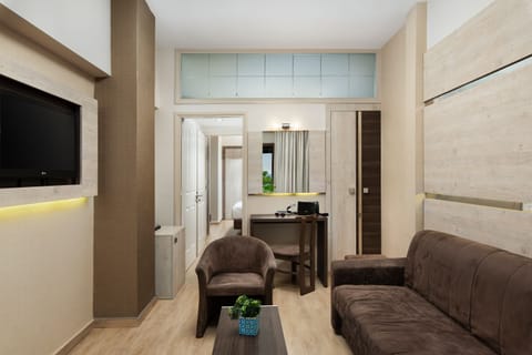 Comfort Apartment | Living room | Flat-screen TV