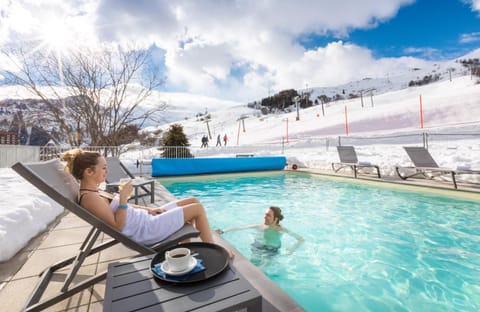 Indoor pool, pool umbrellas, sun loungers