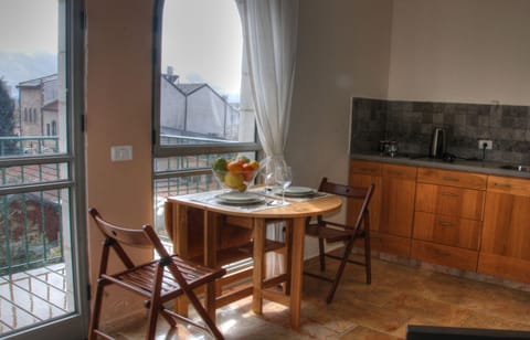 Standard Apartment, 1 Bedroom, Balcony | In-room dining