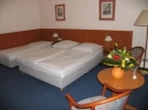 Triple Room | Premium bedding, iron/ironing board, free WiFi