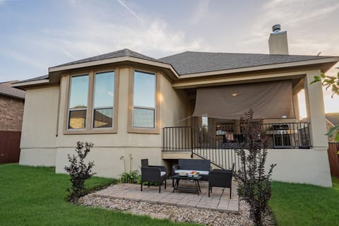 backyard with some seating.