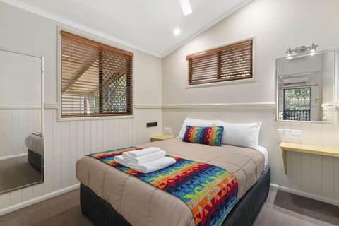 Lorikeet Lodge | Individually decorated, individually furnished, iron/ironing board