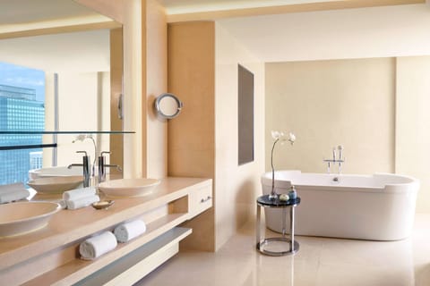 Suite, 1 Bedroom | Bathroom | Separate tub and shower, hair dryer, bathrobes, slippers