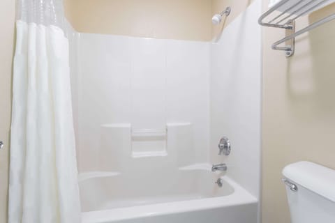 1 King Bed Room | Bathroom | Shower, hair dryer, towels