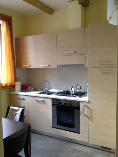 Apartment, 2 Bedrooms | Private kitchen | Full-size fridge, microwave, stovetop, coffee/tea maker