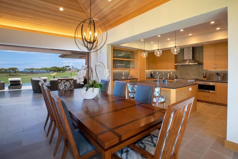 Make every meal a celebration in your spacious dining room — perfect for island feasts and family laughs.