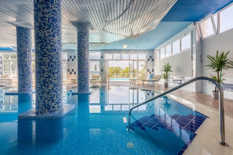 Indoor pool, seasonal outdoor pool, sun loungers