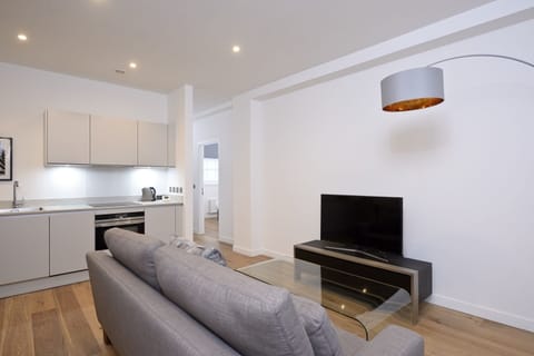 Standard Apartment, 1 Bedroom | Living area | Flat-screen TV