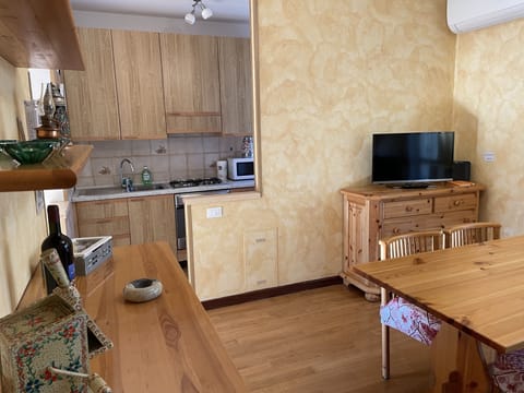 Panoramic Suite, 2 Bedrooms, Lake View | Private kitchen | Full-size fridge, coffee/tea maker, electric kettle, highchair