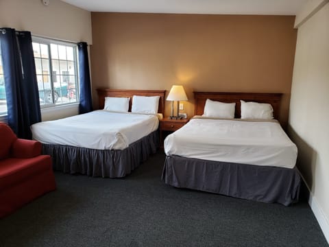 Standard Room, 2 Queen Beds, Non-Smoking w Sofa Bed | Down comforters, desk, blackout drapes, free WiFi