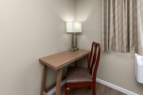 Premium bedding, blackout drapes, iron/ironing board, rollaway beds