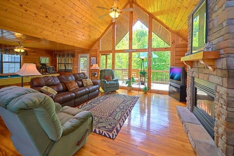 Cabin (African Safari) | Living area | TV, fireplace, MP3 dock