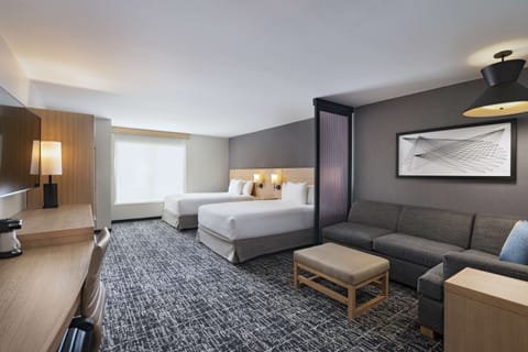 Down comforters, pillowtop beds, in-room safe, desk