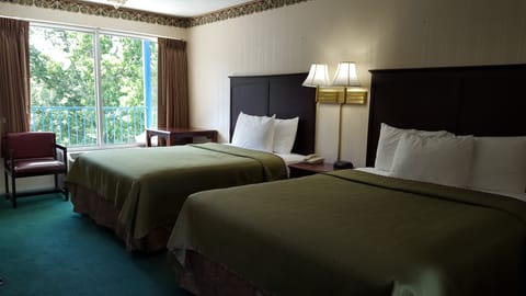 Deluxe Room, 2 Queen Beds | Iron/ironing board, free WiFi, bed sheets, alarm clocks