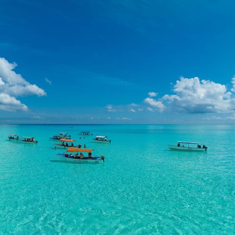 On the beach, white sand, beach towels