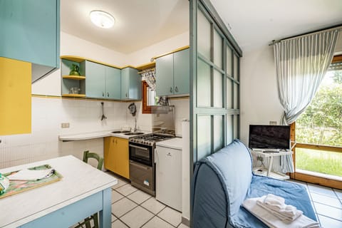 Family Apartment, 3 Bedrooms (La Chimera 700m from sea) | Private kitchenette | Full-size fridge, oven, stovetop, cookware/dishes/utensils