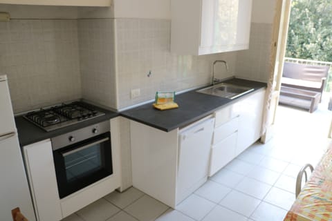 Family Apartment, 3 Bedrooms, Sea Facing (La Rosa - Focette 100m from sea) | Private kitchen | Full-size fridge, oven, stovetop, dishwasher