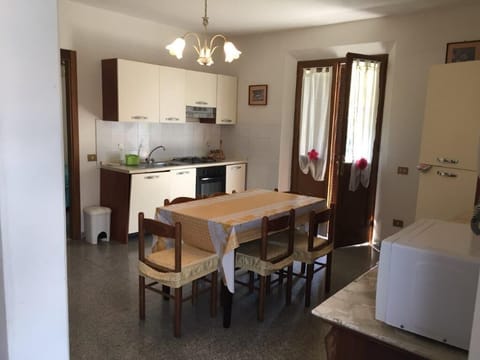 Family Apartment, 4 Bedrooms, 2 Bathrooms (Casa Tirrena 600m from sea) | Private kitchenette | Full-size fridge, microwave, oven, stovetop