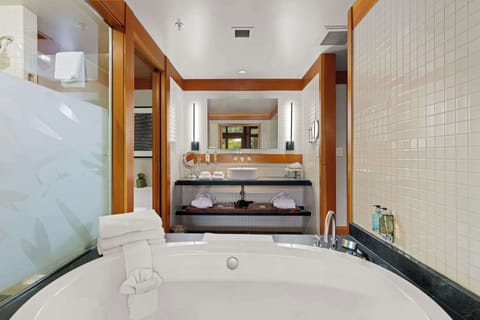 Separate tub and shower, deep soaking tub, designer toiletries