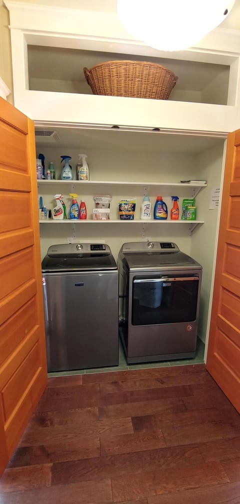 Laundry room on main floor between bedrooms
