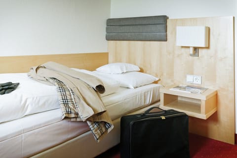 Economy Single Room | Hypo-allergenic bedding, down comforters, minibar, in-room safe