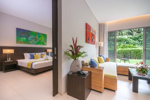 Suite, 1 King bed (Pool Wing) | Living room | Flat-screen TV