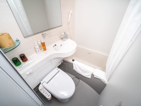 Economy Double Room | Bathroom | Combined shower/tub, deep soaking tub, free toiletries, hair dryer