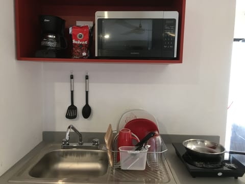 Junior Studio Suite | Private kitchenette | Mini-fridge, microwave, coffee/tea maker, cleaning supplies