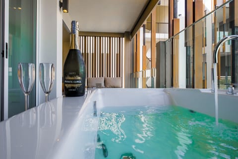 Jacuzzi Spa Suite (80 SQM.) | Minibar, in-room safe, desk, laptop workspace