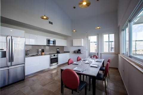 Penthouse, 4 Bedrooms | Private kitchen | Full-size fridge, microwave, oven, stovetop