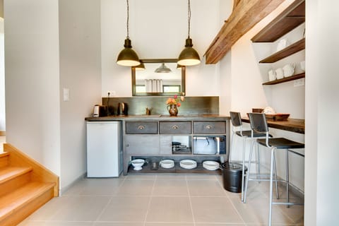 Maison Perriere - Suite Deluxe | Private kitchen | Toaster, highchair, dining tables