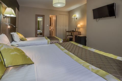 Family Triple Room | Minibar, in-room safe, individually decorated, desk