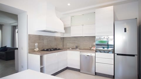 Villa | Private kitchen | Full-size fridge, microwave, oven, stovetop