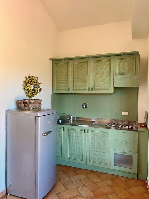 Apartment, 1 Bedroom (Sera&Mattino C) | Private kitchen | Full-size fridge, oven, stovetop, cookware/dishes/utensils