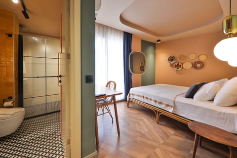 Deluxe Room, Balcony | Bathroom | Shower, free toiletries, hair dryer, slippers